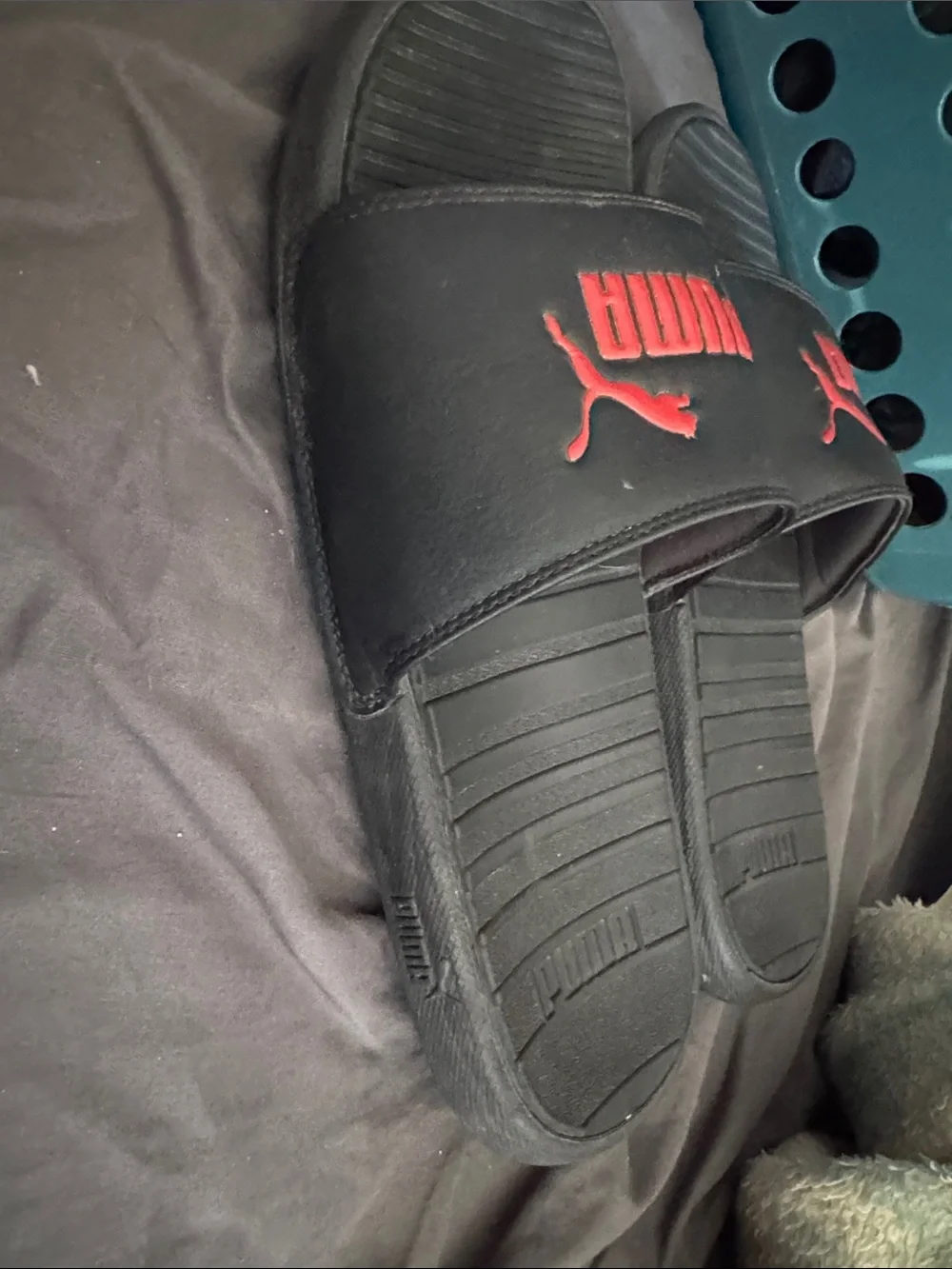 Puma Black Slides with Red Logo Accent